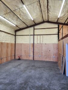 Commercial fluorescent lighting fixtures installed in an industrial space by Johnson Power and Air in Gilbert, AZ.