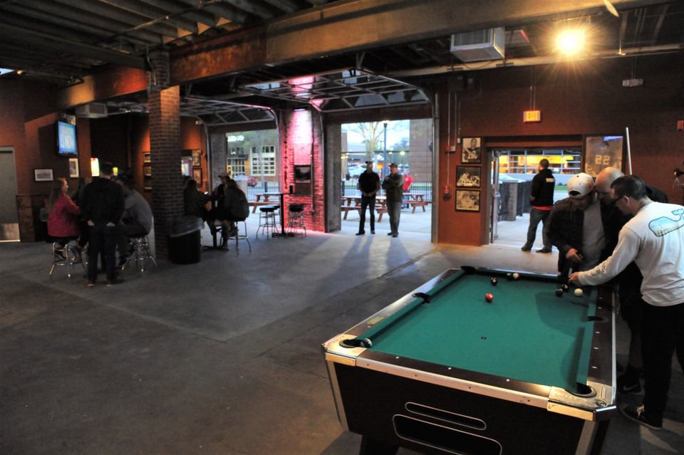 Commercial garage door used as an open entrance in a bar or restaurant by Magic City Door in Birmingham, AL.