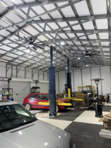 Commercial garage lighting and ceiling fan installation services by East West Electric LLC in Chester, NH.