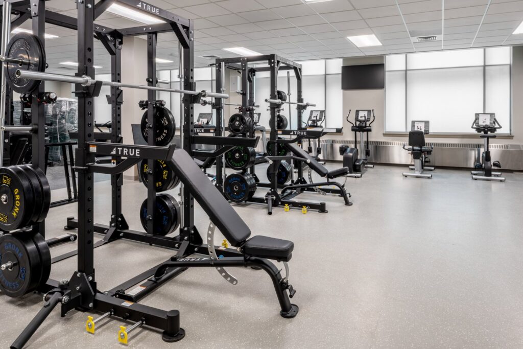 A commercial gym featuring durable rubber flooring installed by Capital Carpet & Flooring Specialists in Wilmington, MA