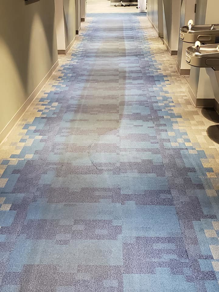 A long, clean commercial hallway carpet with a modern pattern, professionally cleaned by JP Carpet & Tile Care in Sherman Oaks, CA.