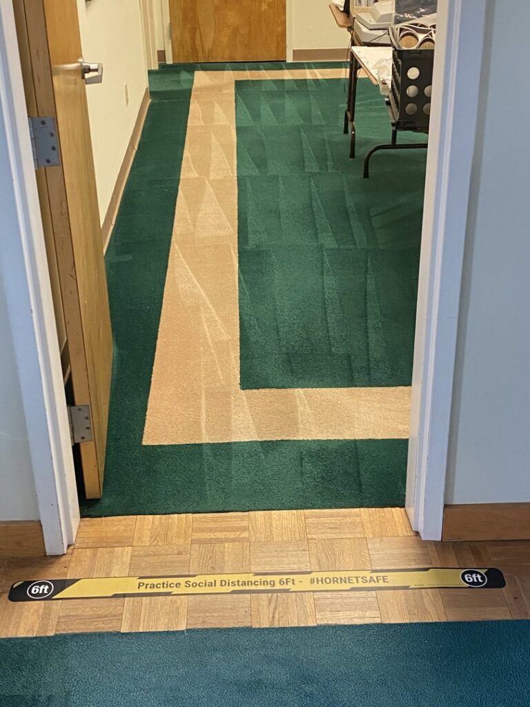 Cleaned patterned carpet in a commercial hallway by M3 Cleaning Solutions, LLC in Montgomery, AL.