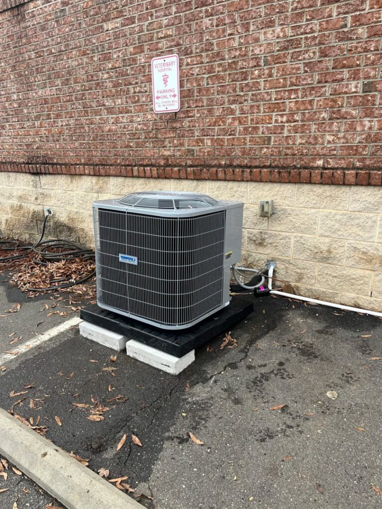 A commercial HVAC condenser unit installed in a parking lot area by On-Target Heating & Air LLC in Rock Hill, SC.