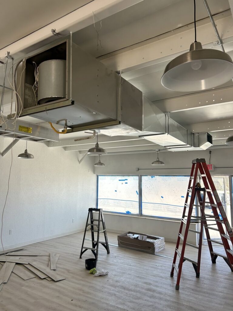 Commercial HVAC ductwork and an air handler unit installed by Climate Solutions. Inc. in Cape Coral, FL.