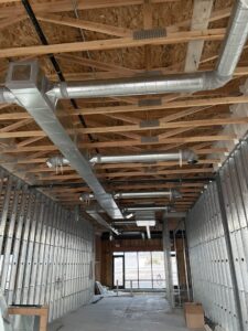 Commercial HVAC ductwork installation in a building under construction by Big Leaf Mechanical LLC in South Salt Lake, UT.