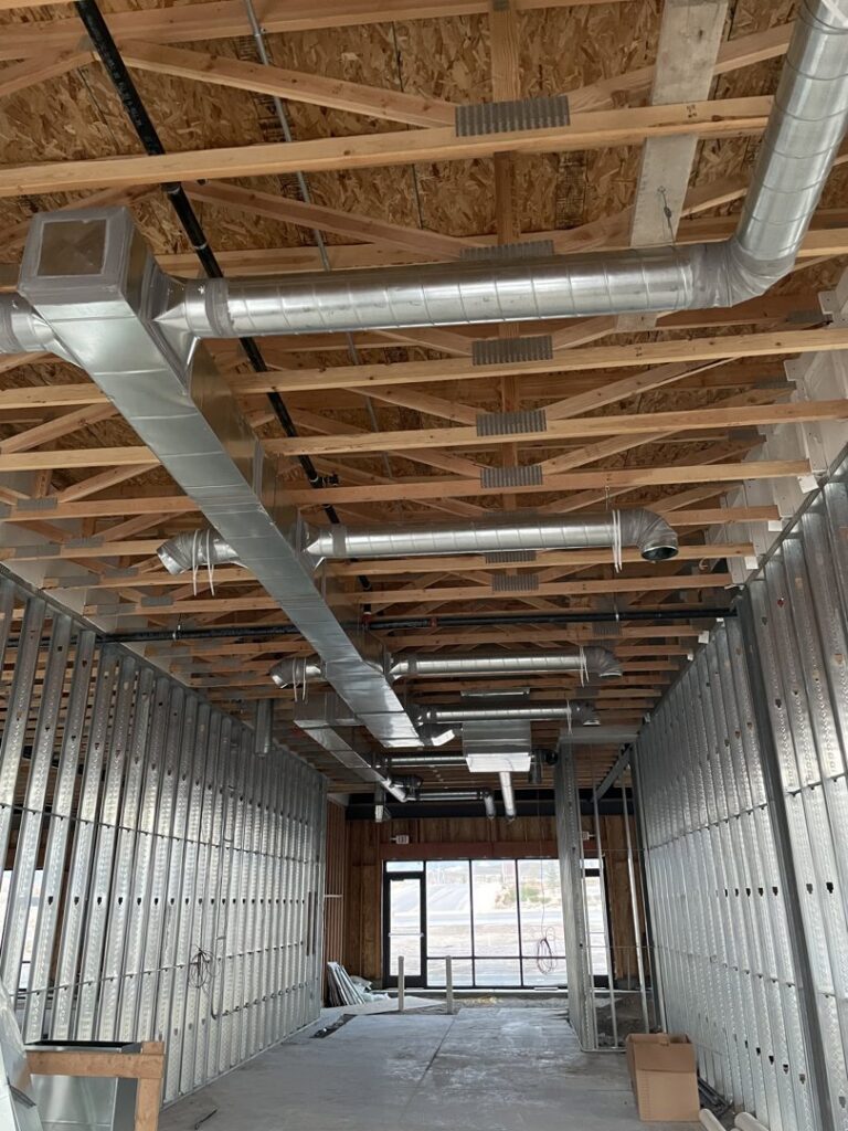 Commercial HVAC ductwork installation in a building under construction by Big Leaf Mechanical LLC in South Salt Lake, UT.