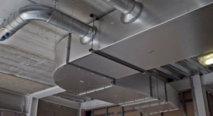 Commercial HVAC ductwork installation on a ceiling, showcasing work by Absolute Mechanical Systems in Southington, CT