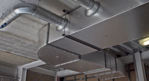 Commercial HVAC ductwork installation on a ceiling, showcasing work by Absolute Mechanical Systems in Southington, CT