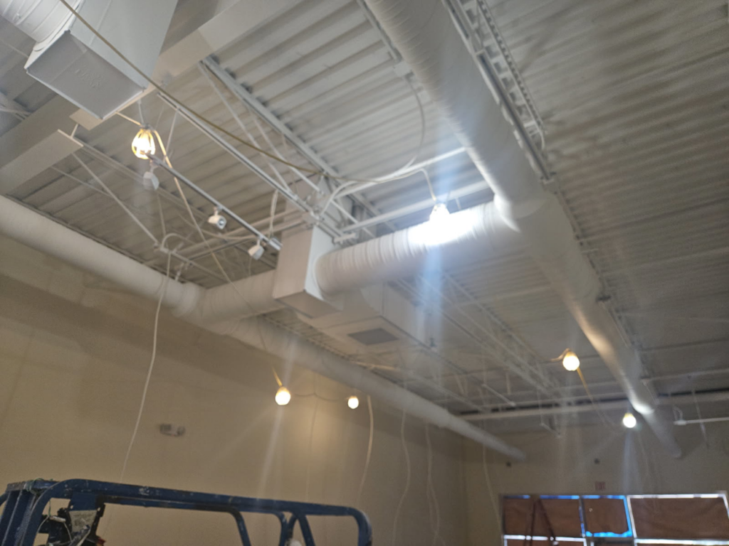 New commercial HVAC ductwork installation in a building by Acclimated Air LLC in Virginia Beach, VA.