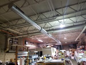 Commercial HVAC spiral ductwork installation in a building by AccuMax Incorporated in Aurora, IL.