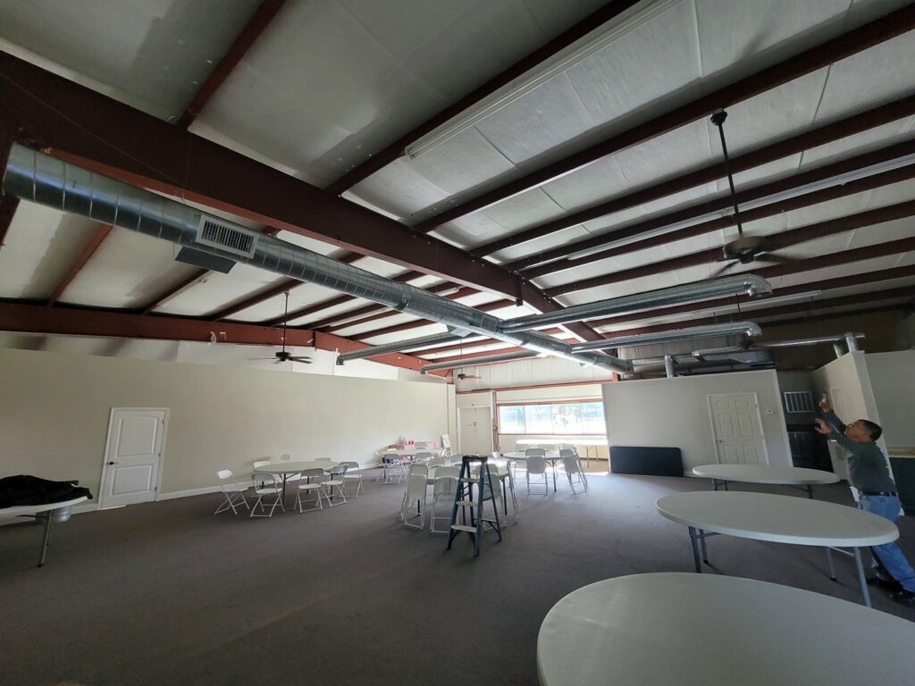 Commercial HVAC ductwork installation in a large space by After Hours Heating & Air Conditioning LLC in Chesapeake, VA.
