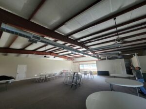 Commercial HVAC ductwork installation in a large space by After Hours Heating & Air Conditioning LLC in Chesapeake, VA.