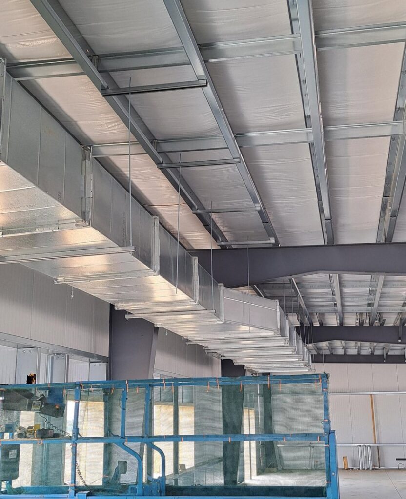 Extensive rectangular HVAC ductwork installed in a large commercial building by Central Consolidated in Wichita, KS