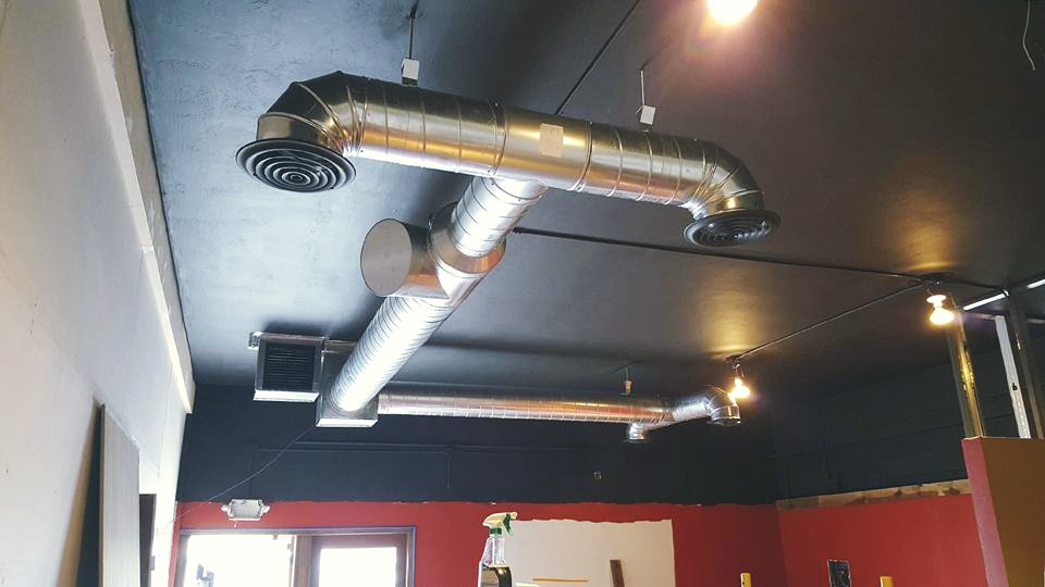 Commercial HVAC spiral ductwork and vents installed by DC AC Air Conditioning & Heating in San Diego, CA.