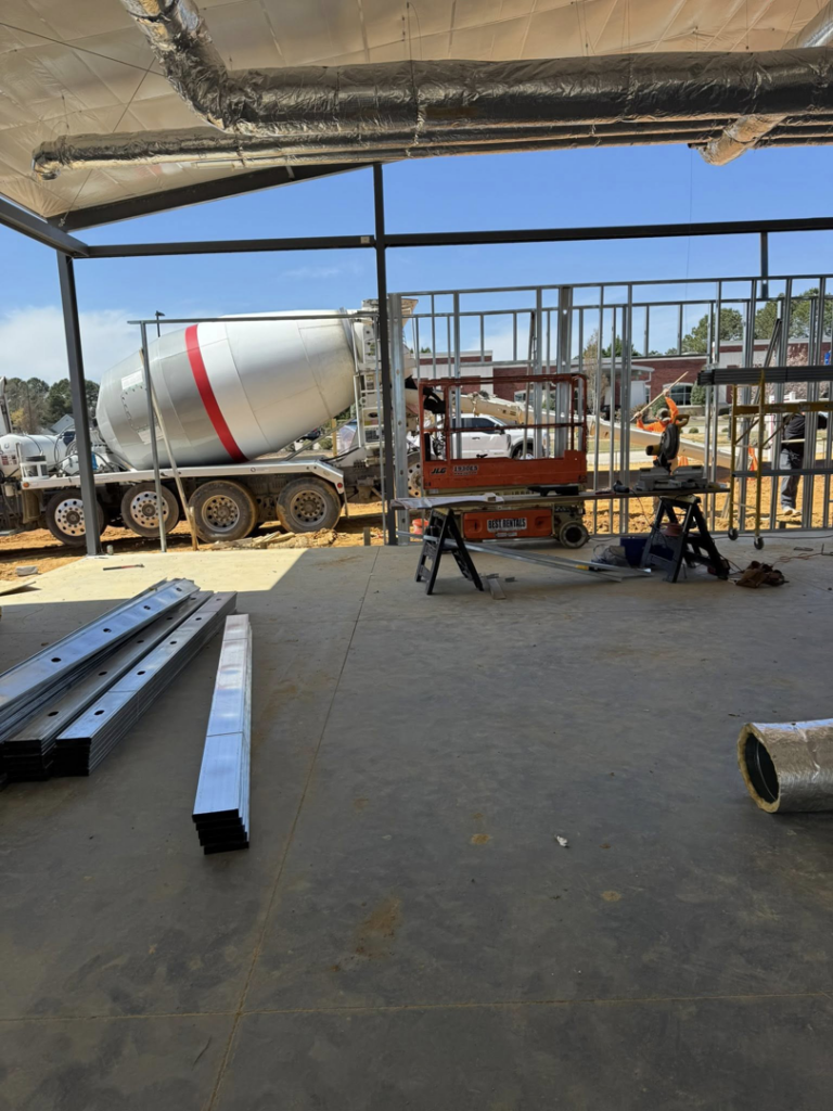 Commercial HVAC ductwork installation in progress at a construction site by Delta Heating, Cooling, Plumbing in Wilson, NC.