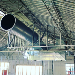 Large commercial HVAC ductwork installed in a building under construction by Elemental Air in Sanford, FL.