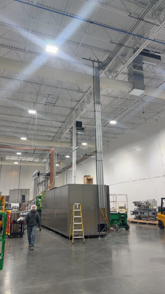 Extensive commercial HVAC ductwork and piping installed in a large facility by KCC Mechanical, LLC in Sandy, UT.