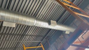 Newly installed commercial HVAC spiral ductwork and vents by KMC Heating and Cooling LLC in Clarksville, TN.