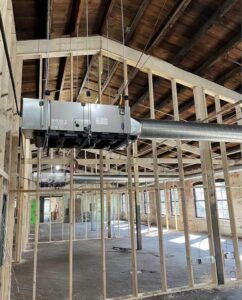 New commercial HVAC ductwork and air handling units installed in a building under construction by SANKS Mechanical in Philadelphia, PA.