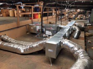 Commercial HVAC ductwork and air handlers installed by Target Temp, LLC in a building in Houma, LA.