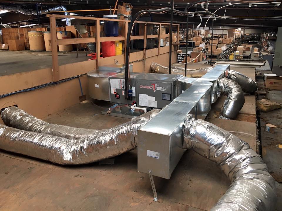 Commercial HVAC ductwork and air handlers installed by Target Temp, LLC in a building in Houma, LA.