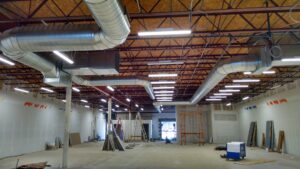Extensive commercial HVAC ductwork installation in a large building by Vision Air Services in Tulsa, OK.