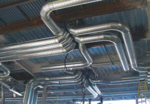 An extensive commercial HVAC ductwork system installed by Vision Air Services in Tulsa, OK.
