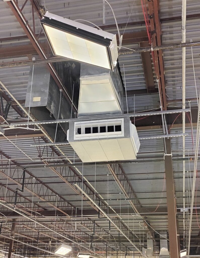 Commercial HVAC ductwork and units installed in a large building by Icy Hot HVAC in Spartanburg, SC