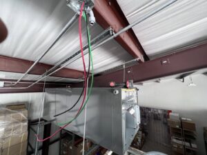 Commercial HVAC electrical conduit and wiring installation on a ceiling, performed by Quistian Lighting in Arlington, TX