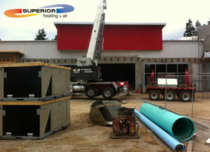 Commercial HVAC units on a construction site for installation by Superior Heating & Air in Harvest, AL.