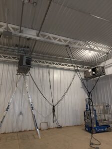 Commercial HVAC units being installed or serviced in a large building by Oklahoma Climate Solutions in Oklahoma City, OK.