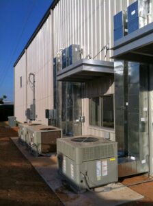 Commercial HVAC installation featuring multiple outdoor units and extensive ductwork by Air Care Heating and Cooling Services in Shreveport, LA.