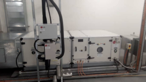 Large commercial LG HVAC units with ductwork and control boxes, installed by Facilityfix technicians in Port Harcourt, NG.