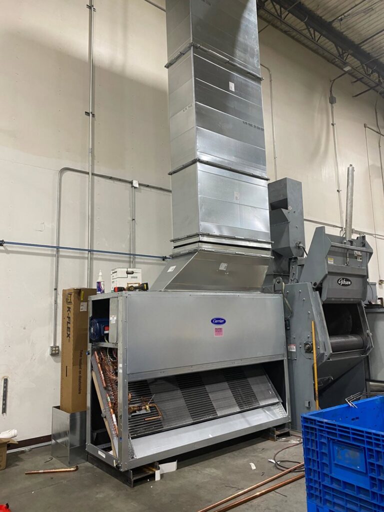 A large commercial HVAC unit with extensive ductwork installed by Cafco Services in Cincinnati, OH.