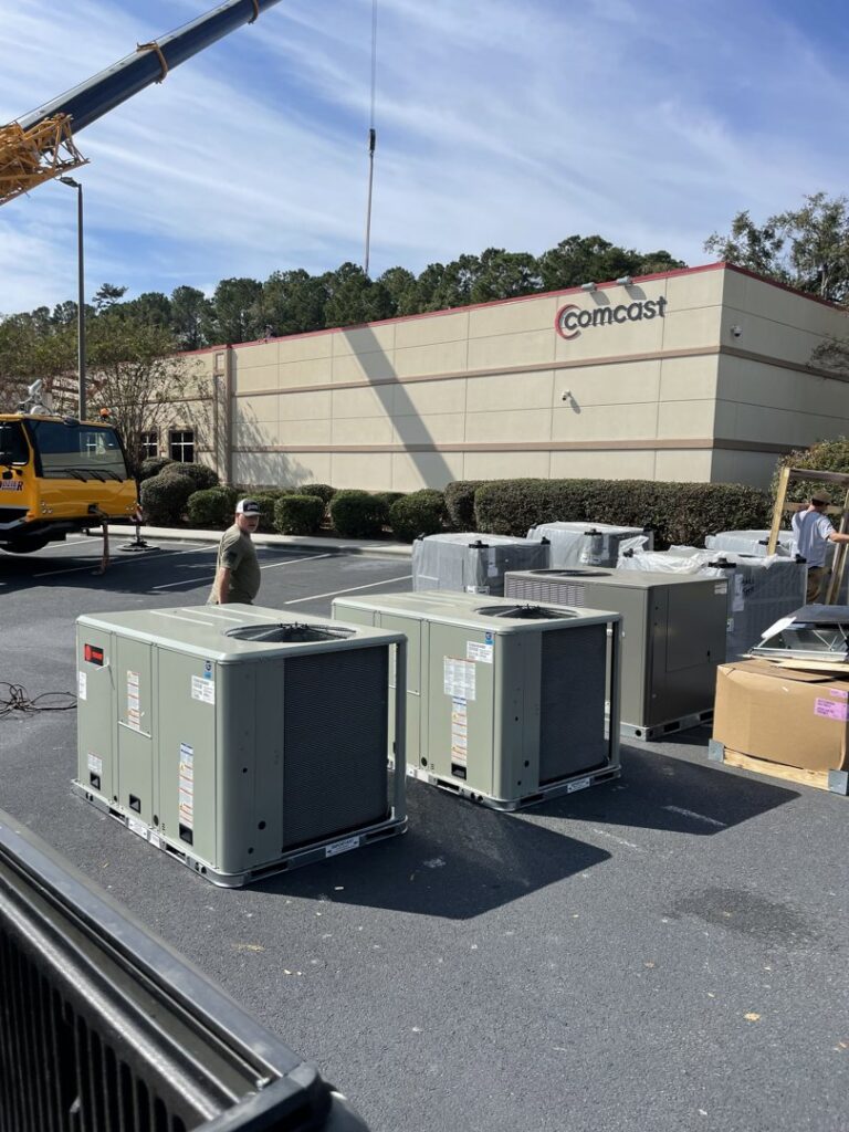 Large commercial HVAC units being installed with a crane in the background by 5 Star Charleston Heating and Air in Charleston, SC.