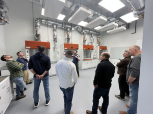 Commercial HVAC ventilation system installation with fume hoods and ductwork at Buckley Associates, Inc. in Hanover, MA