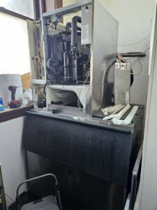 Internal components of a commercial ice machine during maintenance by Henry Refrigeration & Hvac Utah in Ogden, UT.