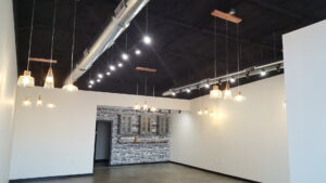 Commercial interior with new lighting fixtures installed by Red Earth Electric LLC in Oklahoma City, OK.