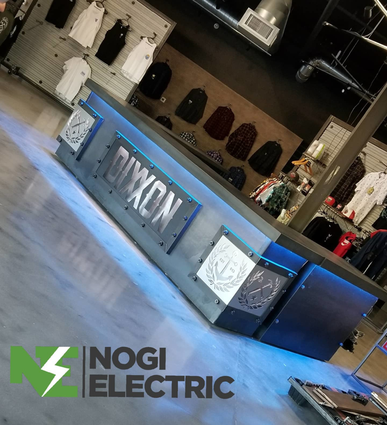 Commercial LED lighting installation on a retail counter by Nogi Electric LLC in Mesa, AZ.