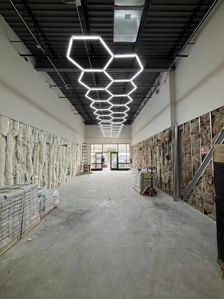 Commercial LED hexagonal lighting installation in a new building by Wilson Electrical Contractors in Orlando, FL.