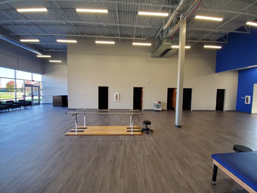 Large commercial space illuminated by new LED panel lighting installed by Electrifying Services in Indianapolis, IN