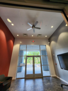 Commercial lighting and ceiling fan installation at an entrance by ASAP Electrical Construction Inc. in Dallas, GA