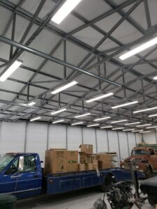 Commercial LED strip lighting installed in a large warehouse by Everyday Electric in Tampa, FL.