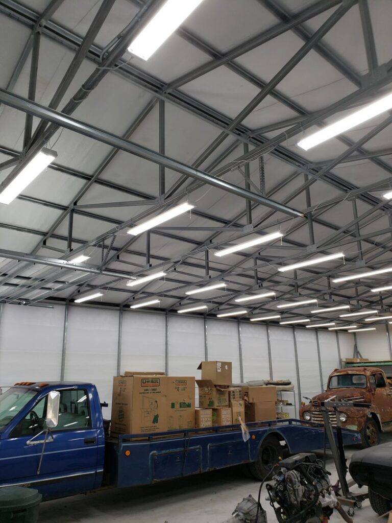 Commercial LED strip lighting installed in a large warehouse by Everyday Electric in Tampa, FL.