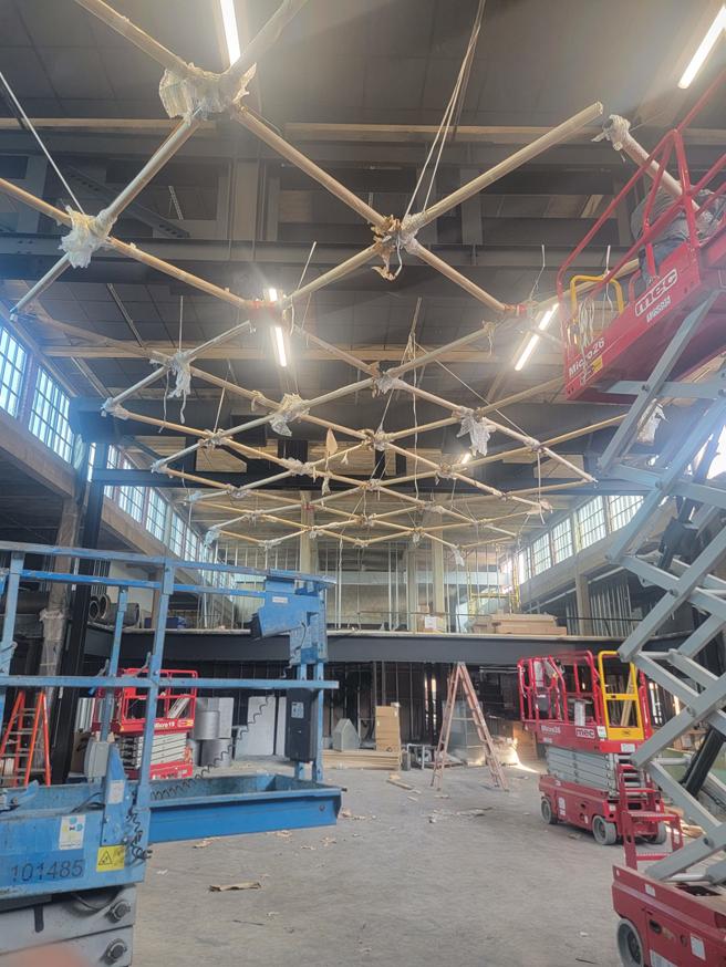 Commercial lighting installation in a large building by No Shorts Electrical in Midlothian, TX.