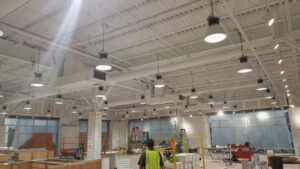 Commercial lighting installation in a large space under construction by Right Electrical Services LLC in Raleigh, NC.