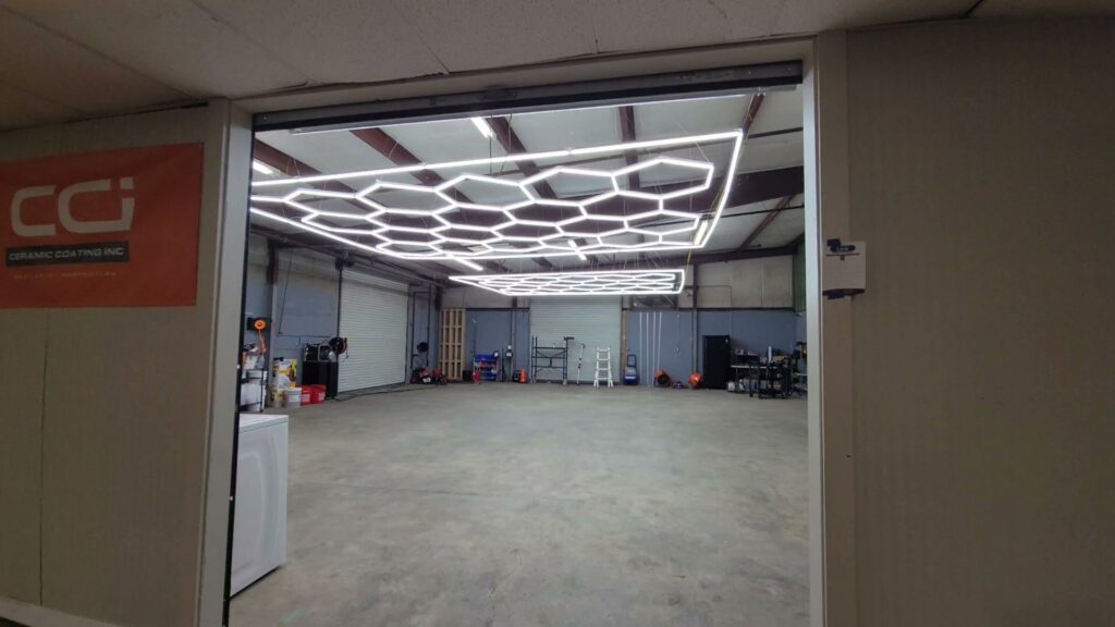 Overhead view of a commercial space with a unique hexagonal LED lighting grid installed by Sherrill Company, LLC Electrical Contractors in Columbus, GA.