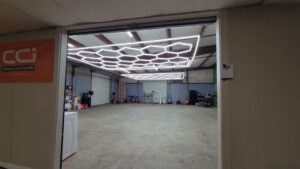 Overhead view of a commercial space with a unique hexagonal LED lighting grid installed by Sherrill Company, LLC Electrical Contractors in Columbus, GA.