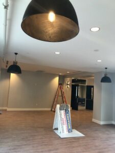 Commercial lighting project with pendant and recessed lights by Empower Electric, LLC in Nashville, TN.