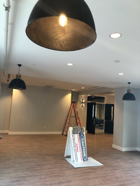 Commercial lighting project with pendant and recessed lights by Empower Electric, LLC in Nashville, TN.
